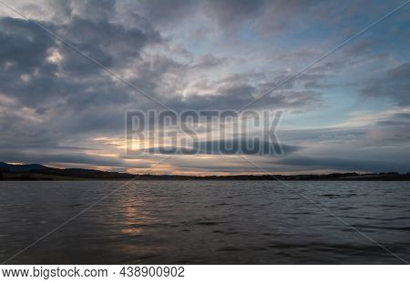 Amazing Dramatic Sunset Sky With Cumulus Cloud On Pond Dehtar. Czech Landscape