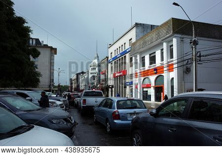 Osorno, Chile - 9 January, 2019: Busy parking on side of street Manuel Antonio Matta in downtown
