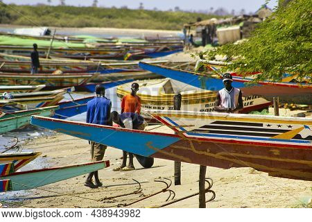 Senegal, Africa - Marsch Circa, 2016. Scene Of M'bour Great Fish Market On The Beach. People Waiting