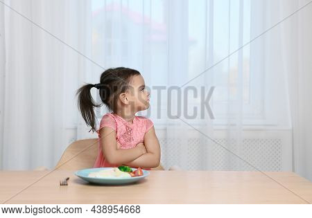 Cute Little Girl Refusing To Eat Her Breakfast At Home, Space For Text