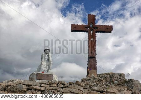 SAN MARTINO DI CASTROZZA,ITALY - DECEMBER 26, 2015: Monument at the end of the trekking 