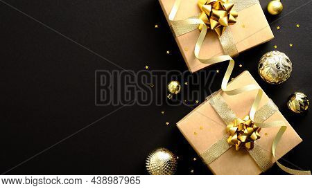 Luxury Christmas Banner Design. Flat Lay Gift Boxes With Golden Ribbon, Gold Baubles, Confetti On Da