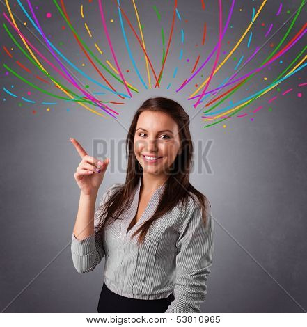 Pretty young girl thinking with colorful abstract lines overhead