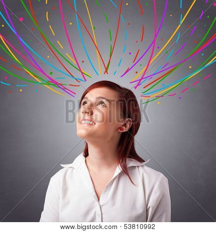 Pretty young girl thinking with colorful abstract lines overhead