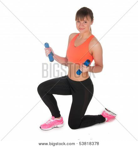 Fitness Woman Exercising With Dumpbells