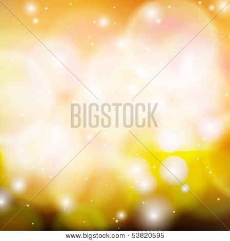 Shining vector abstract bokeh in gold.