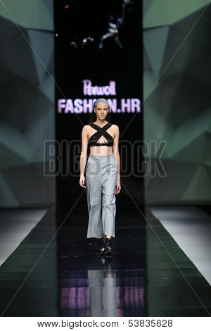 ZAGREB, CROATIA - OCTOBER 17: Fashion model wearing clothes designed by Petra Vuletic and Sasa Hortig on the 'Fashion.hr' show on October 17, 2013 in Zagreb, Croatia.
