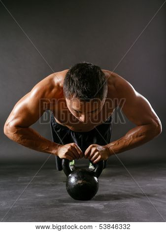 Pushups With Kettlebell