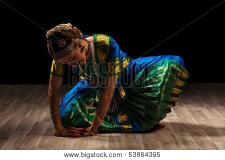 Young beautiful woman dancer exponent of Indian classical dance Bharatanatyam