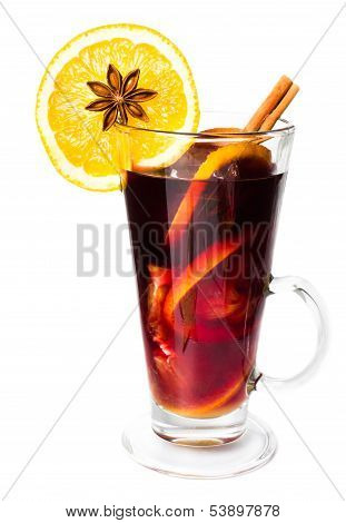 Hot Red Mulled Wine For Winter And Christmas With Orange Slice, Anise And Cinnamon Sticks Isolated O