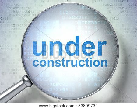 SEO web design concept: Under Construction with optical glass