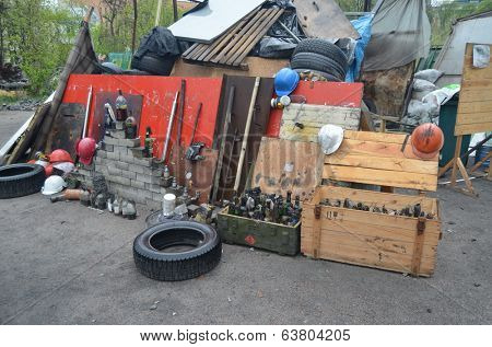 KIEV, UKRAINE - APR 19, 2014: Downtown of Kiev.Camp decoration with military items.Rioters camp.Putsch of Putsch.April 19, 2014 Kiev, Ukraine 