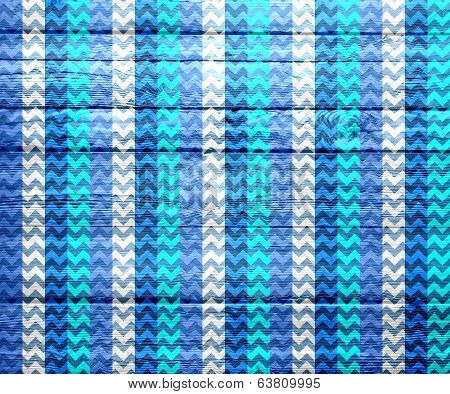 Blue chevron pattern on wood texture