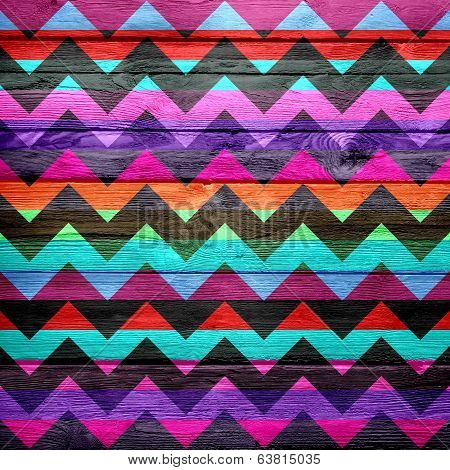 Colorful chevron pattern on wood texture