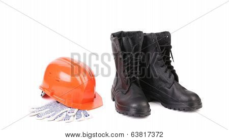Kersey boots and hard hat on gloves.