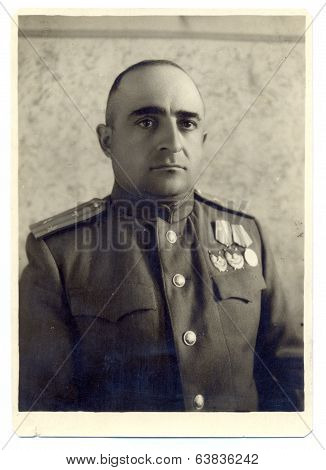 studio photo portrait of an aviation lieutenant Colonel of the Soviet Army