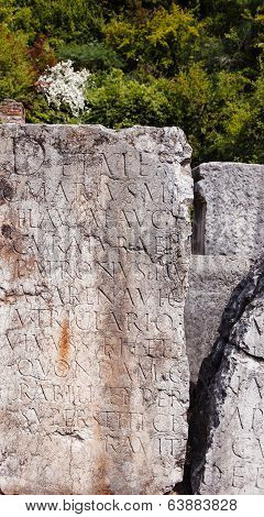 Latin Inscription On Tomb Plate