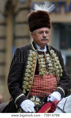 ZAGREB, CROATIA - OCTOBER 04: The parade of 70 participants, thirty horses and forty members of a brass band to the main square were announced next, 300th Sinjska Alka, on October 04, 2014 in Zagreb.