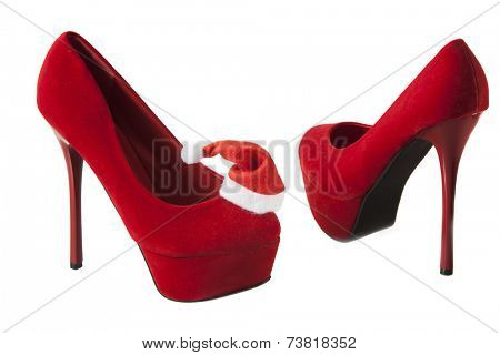 High heels shoes with santa hat.