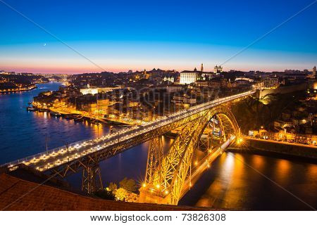 Dom Luiz bridge in Porto Portugal at dusk