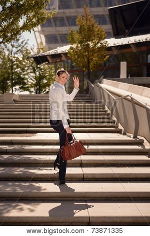 Woman Walking On Stairs Waving Hand