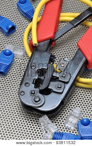 Crimping tool with network cable and connectors