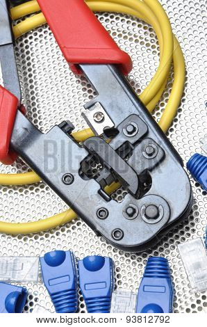 Crimping tool with network cable and connectors