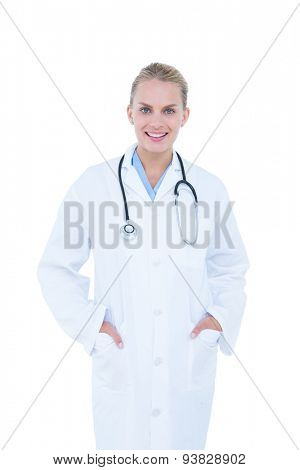 blond female doctor against white background