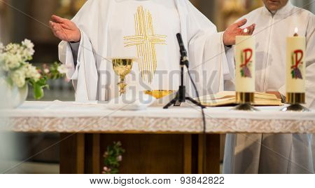 Priest during a wedding ceremony/nuptial mass
