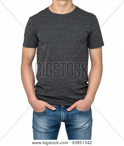 Man Wearing Dark Grey T-shirt Isolated On White Background. Hands In The Pockets.