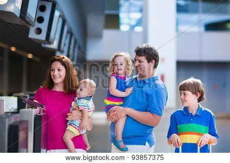 Family With Kids At Airport