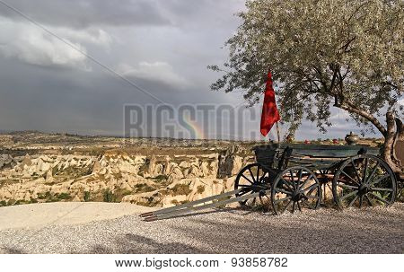 wagon, rainbow and red flag