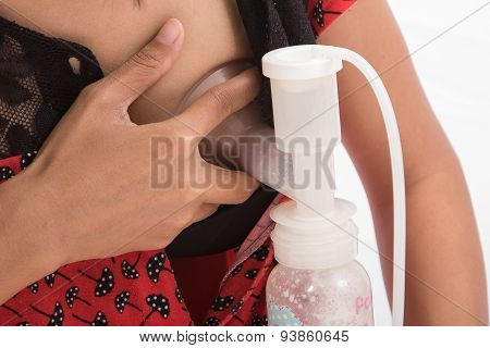 Mother Pumped Breast Milk From The Breast.