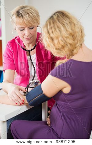 Pregnant Woman Having Pressure Measured