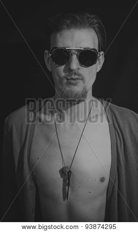 Young Man In Round Sunglasses