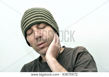 Man With Swollen Face Suffering From Toothache