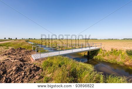 Newly Constructed Modern Aluminum Bridge Over A Creek