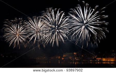 Big colorful fireworks explode in Malta in dark sky,Malta fireworks festival, 4 July, Independence