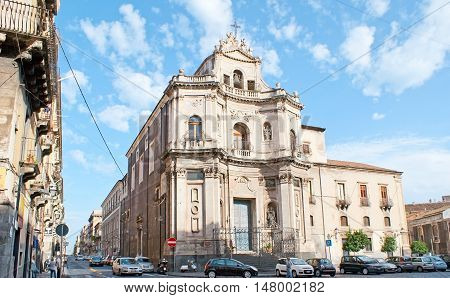 CATANIA ITALY - OCTOBER 10 2012: The facade of St Placido church is slightly concave inward and decorated with sculptures and carvings on October 10 in Catania.