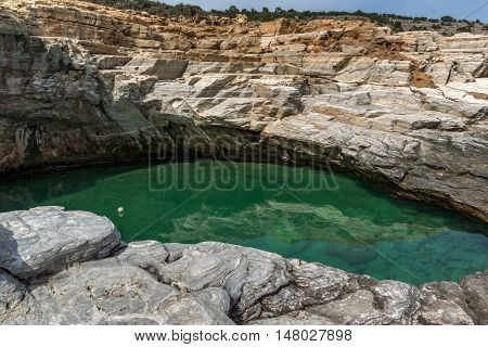 Clean waters of Giola Natural Pool in Thassos island, East Macedonia and Thrace, Greece