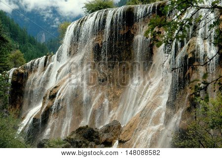 Jiu Zhai Guo / Sichuan China - August 22 2006: Spectacular Pearl Shoal Waterfall at Jiu Zhai Gou National Scenic Park