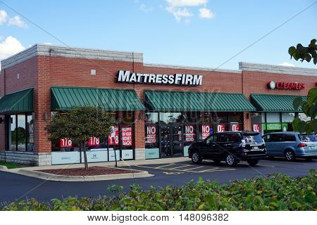 PLAINFIELD, ILLINOIS / UNITED STATES - SEPTEMBER 17, 2016: One may purchase mattresses at the Mattress Firm store in a Plainfield strip mall.