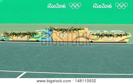 RIO DE JANEIRO, BRAZIL - AUGUST 14, 2016: Medal podium during tennis women's doubles final medal ceremony at the Maria Esther Bueno Court of the Rio 2016 Olympic Games  at the Olympic Tennis Centre