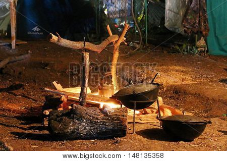 Bonfire night in the tourist camping Hiking utensils