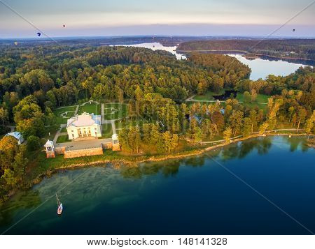Trakai, Lithuania: Aerial UAV top view of Uzutrakis Palace in the autumn sunset