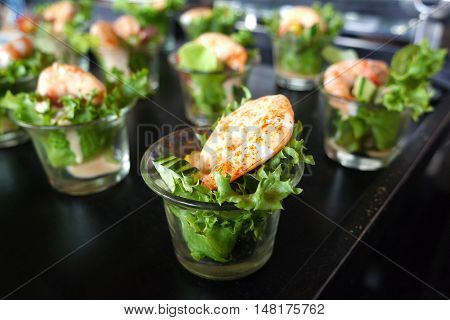 Prawn Cocktail lettuce leaves lemon wedge Isolated on black