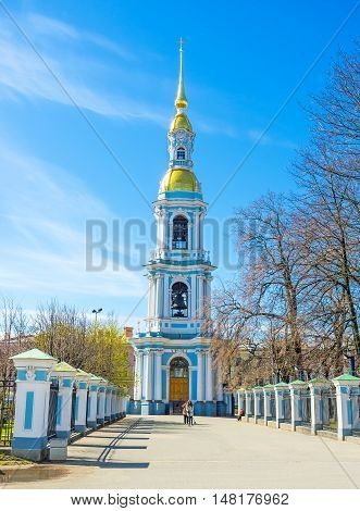 ST PETERSBURG RUSSIA - APRIL 25 2015: The slender bell tower of the Maritime Cathedral of St Nicholas (Sailors' Cathedral) with the tall golden spire on April 25 in St Petersburg.
