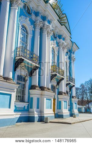 The bright blue facade with white columns of the St Nicholas Naval Cathedral in St Petersburg Russia.