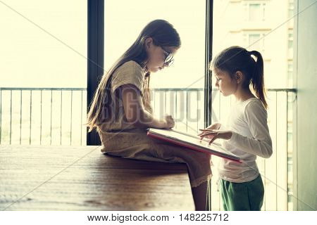 Girls Reading Book Study Concept