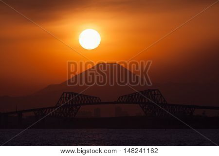 Diamond Fuji View of the setting sun meeting the summit of Mt. Fuji